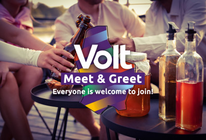 In the background people are sitting together, drinking from what appears to be beer bottles. In front the Volt logo can be seen with additional text stating 