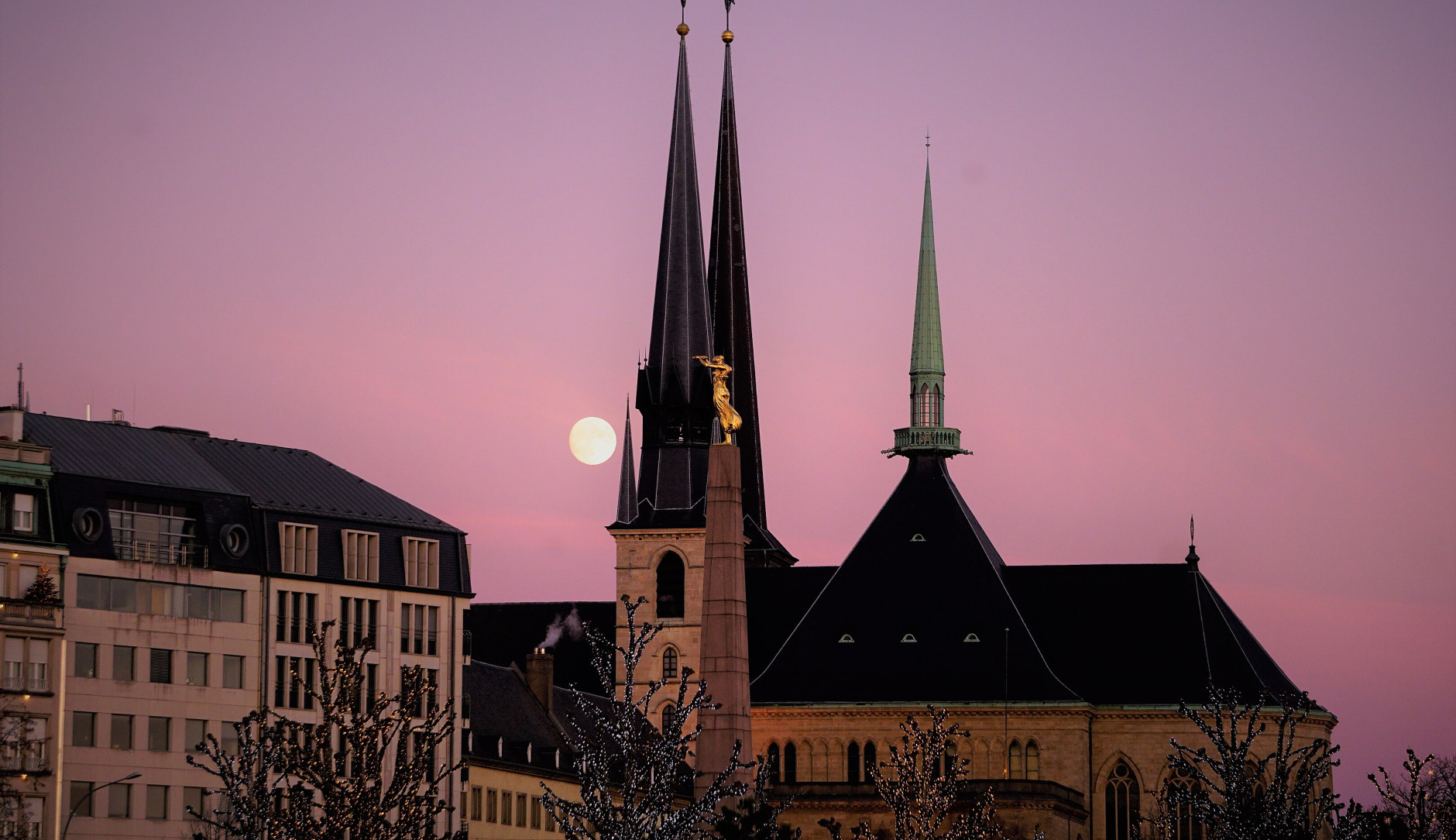 The cathedral of Luxembourg in the sunset, the momunemtn of the Golden Lady just in front of the shot