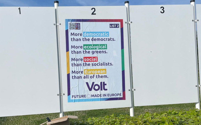 Poster saying: More democratic than the democrats. More ecological than the greens. Mor social than the socialists. More European than all of them. Volt. Future made in Europe.